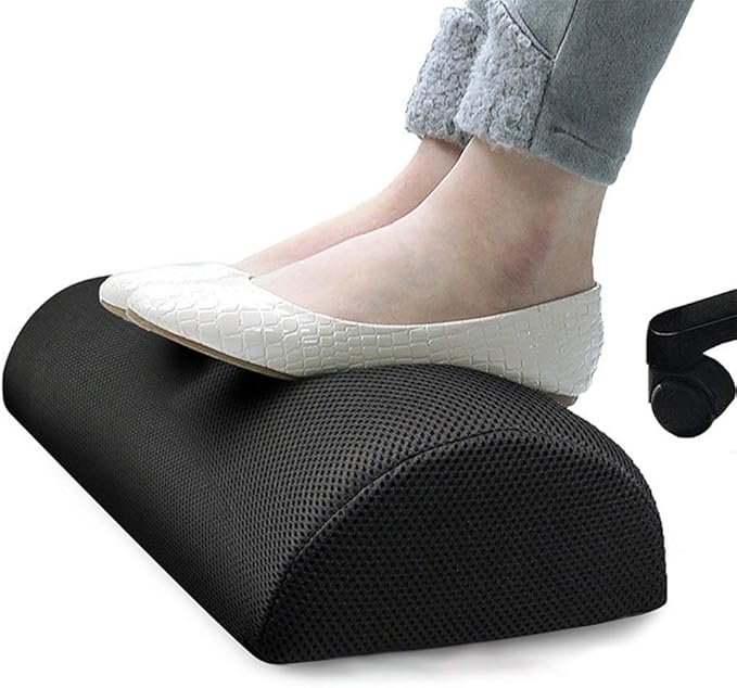 Woman's legs resting on footrest